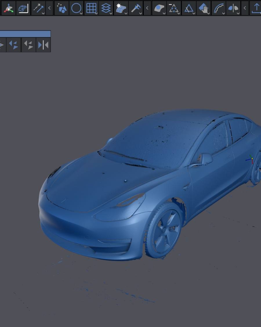 A complete car captured as 3D scan data, body panels and all