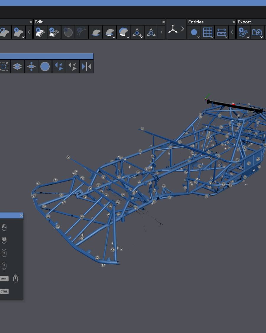 A full race chassis captured as scan data, reference targets still in place