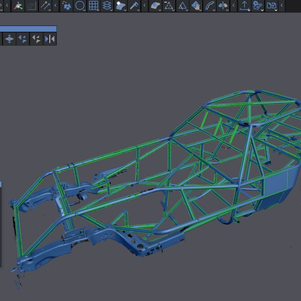 Scan data of a chassis with modelled tube centrelines traced over it in green