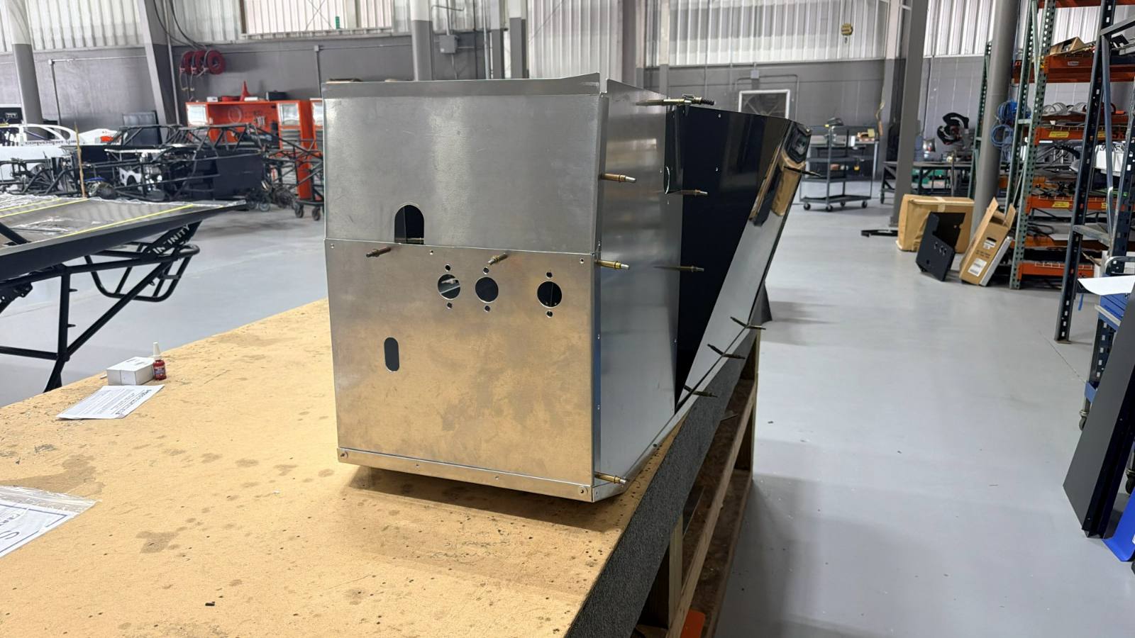 A sheet metal enclosure cut, formed and assembled in the shop